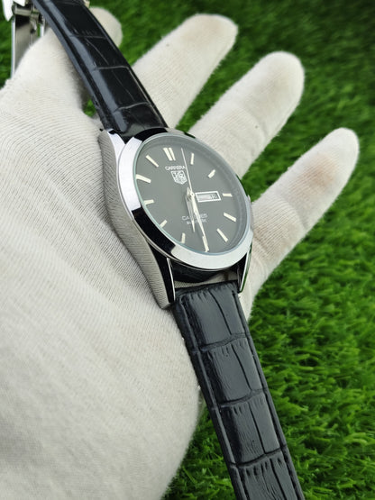 Black leather strap watch