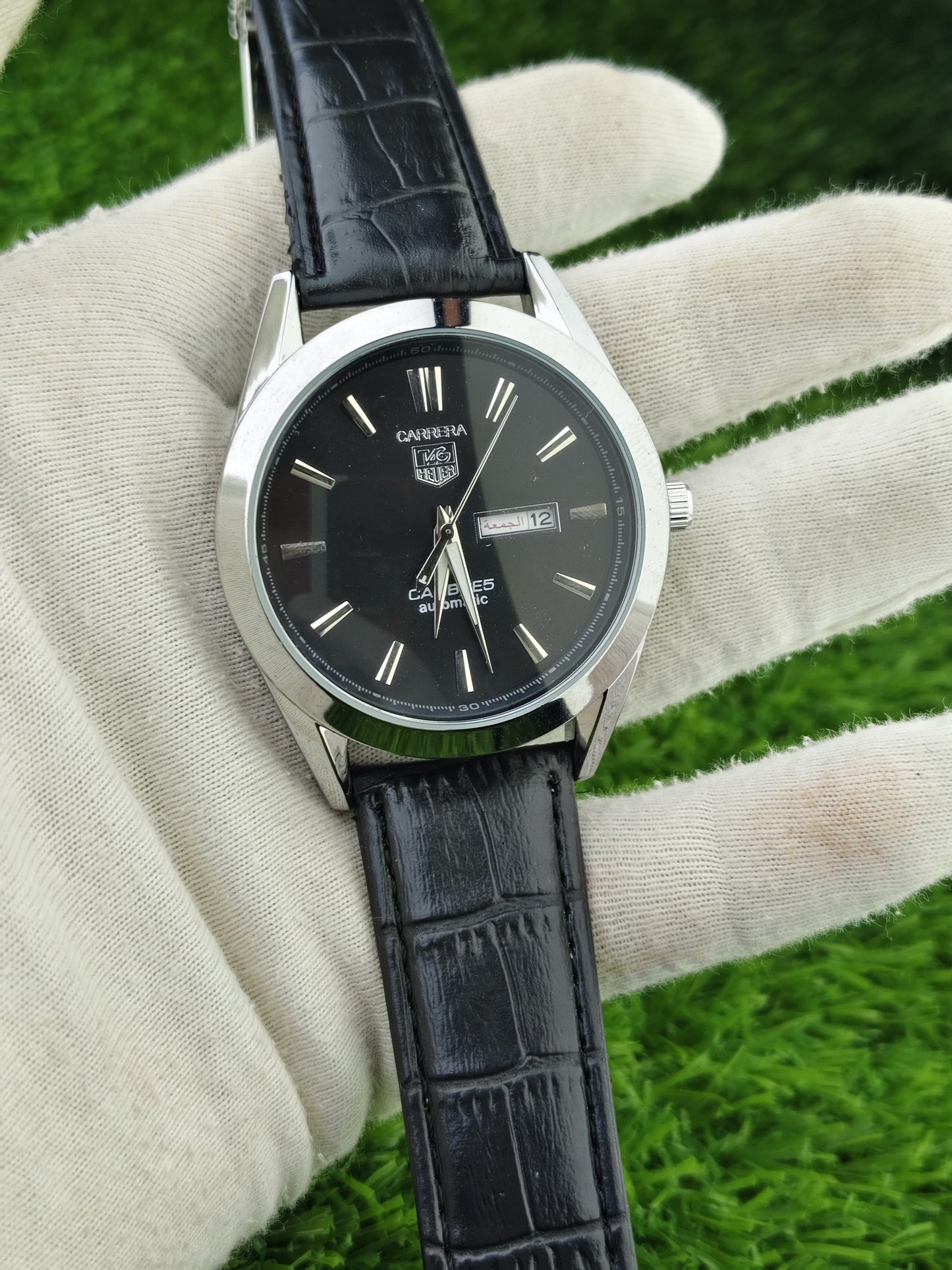 Black leather strap watch